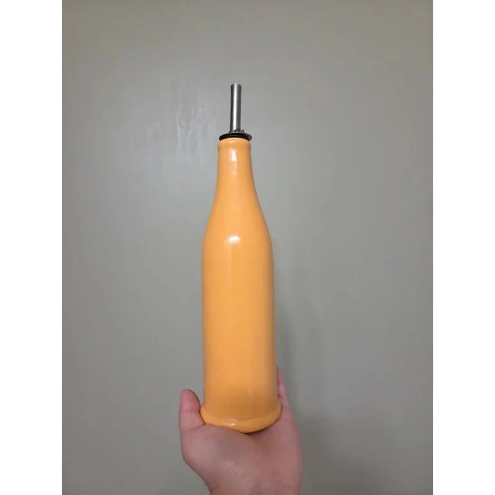 vintage ceramic olive oil cruet yellow